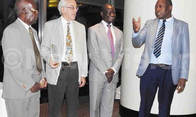 MoH awards Prof. Kayanja, Wilson for fighting cancer MoH awards Prof. Kayanja, Wilson for fighting cancer