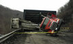 The overturned coal truck in which a 54-year old driver was killed.