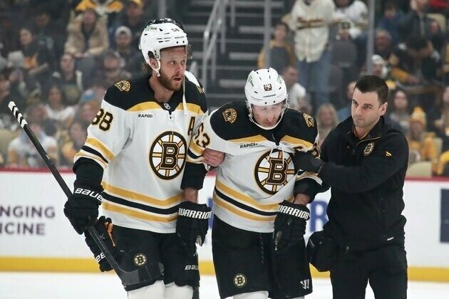 Bruins' Brad Marchand (upper-body injury) deemed week-to-week