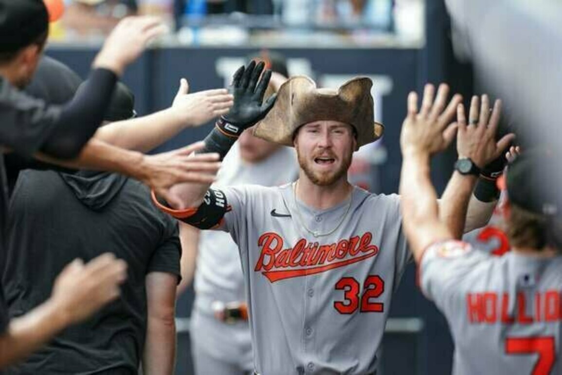 Orioles use power to subdue Rays
