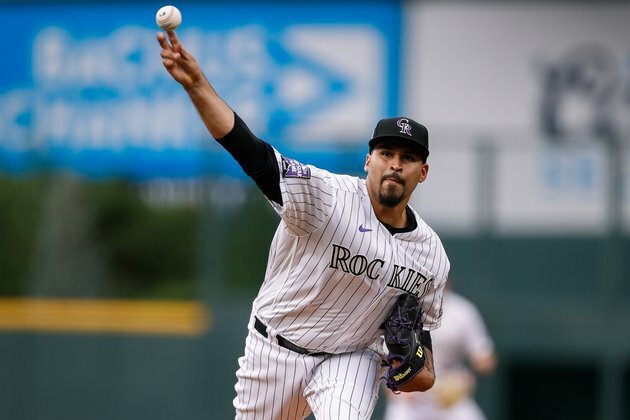 Rockies pull out 10-inning win over Brewers
