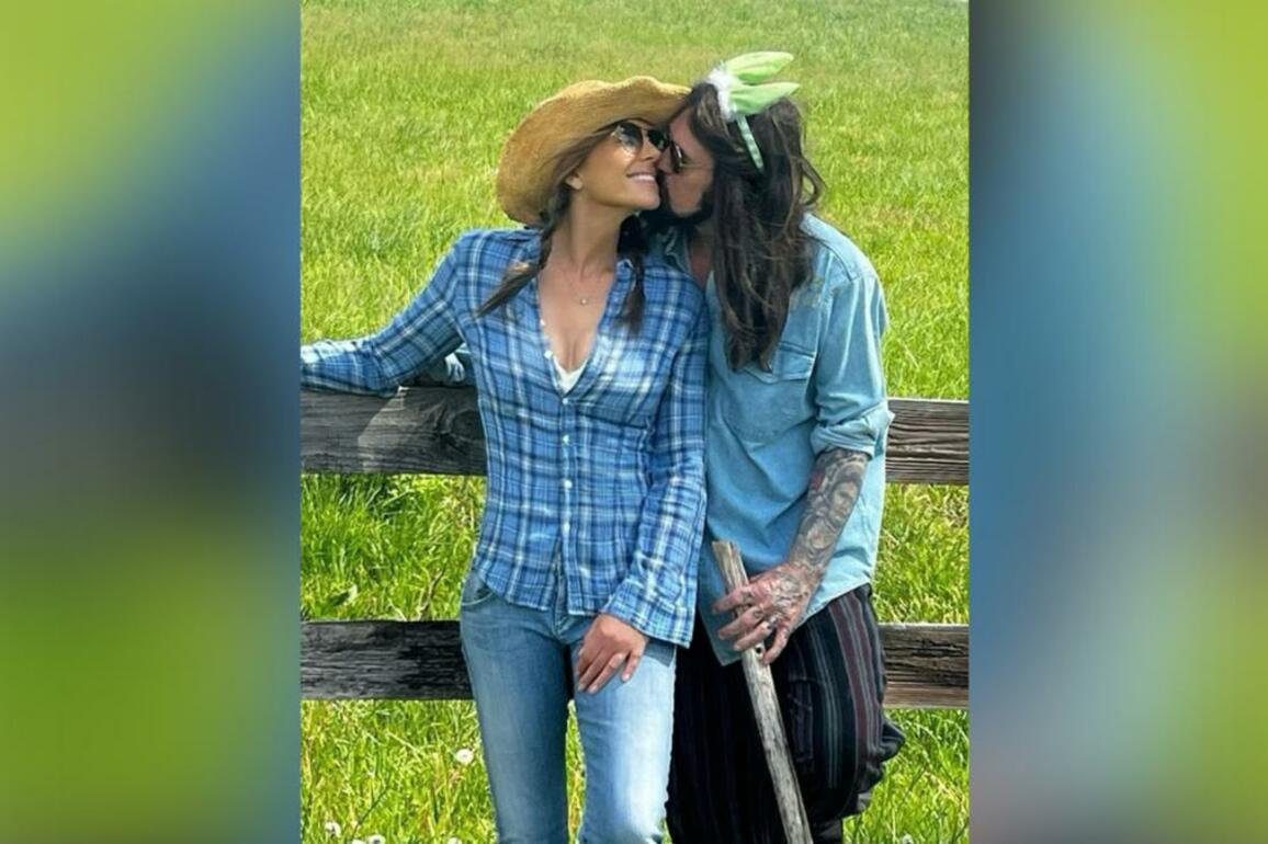 Elizabeth Hurley posts photo kissing Billy Ray Cyrus, fans in flurry over possible relationship