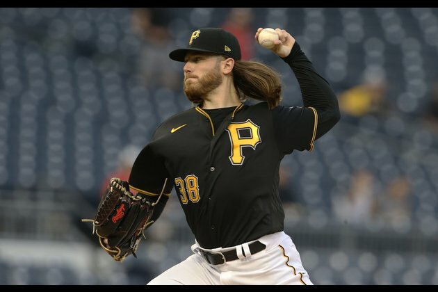Pirates build early lead, hold off Reds