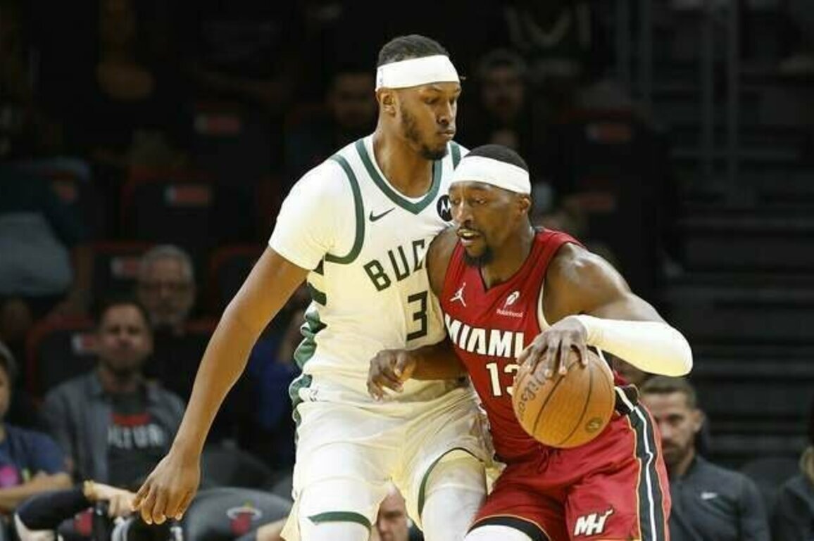 Heat hold on for sixth straight win at Bucks' expense
