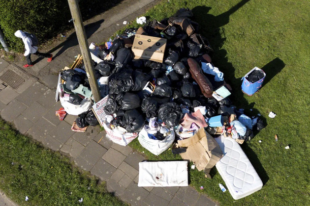 Garbage piles up on streets of UKs second-largest city after monthlong sanitation strike