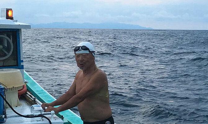 Japanese man, 73, completes record swim across strait Japanese man, 73, completes record swim across strait