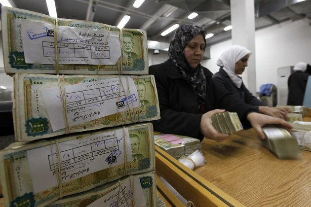 Syrian Currency Hovers Near Record Lows on Black Market