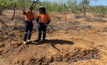  Discussing the past: Kam Bhowany and Zhengdon Han standing on one of the sampled tailings deposits.