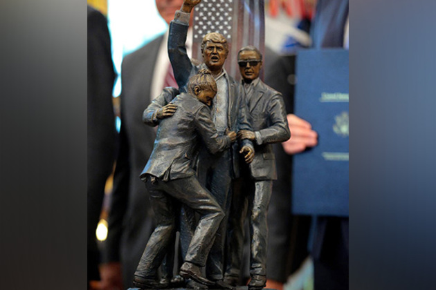 Trump installs statue depicting 2024 assassination attempt in Oval Office