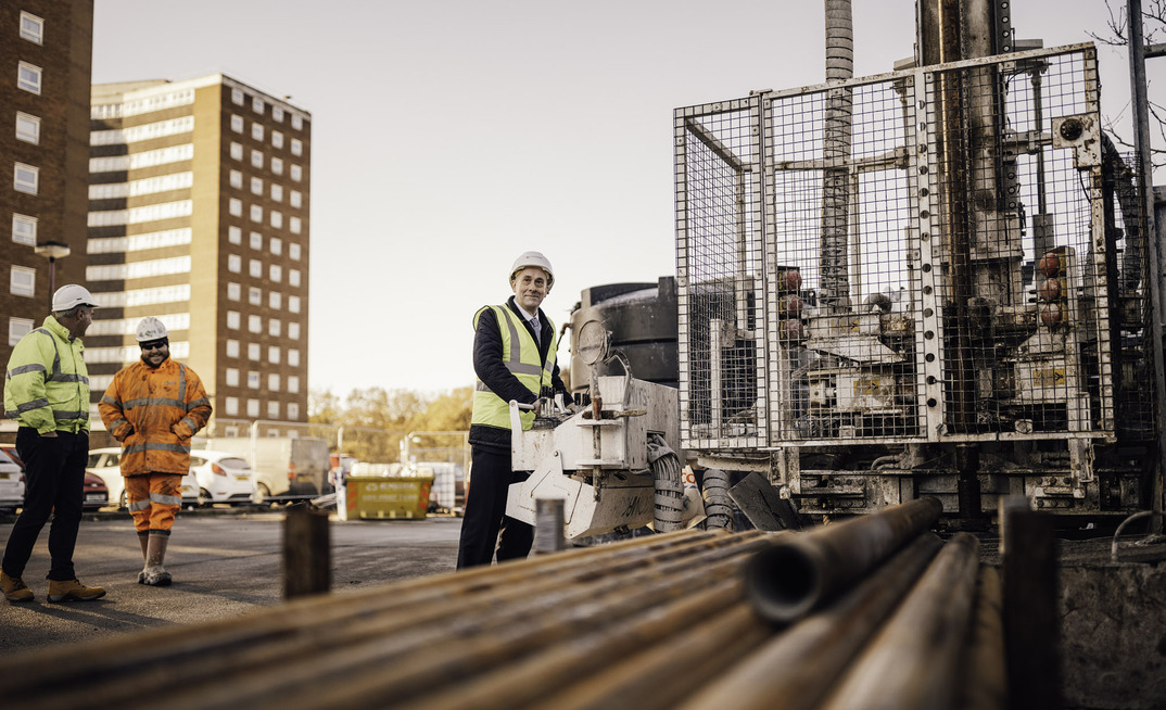 Lord Callanan, parliamentary undersecretary of state at the Department for Business, Energy and Industrial Strategy, at the site of the borehole drilling for the ground source heating project at Chadwell St Mary. Credit: Kensa