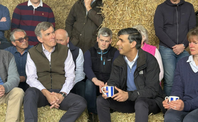 Prime Minister Rishi Sunak joined Macclesfield's Conservative parliamentary candidate David Rutley (right) at Rowlingson's farm in Cheshire to meet farmers and bottle feed lambs (Cheshire East Council Conservative Group)