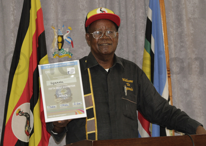 inister of ourism rof phraim amuntu displaying the award won at  2017 nternational ourism xpo in erlin hoto by anielle alukenge