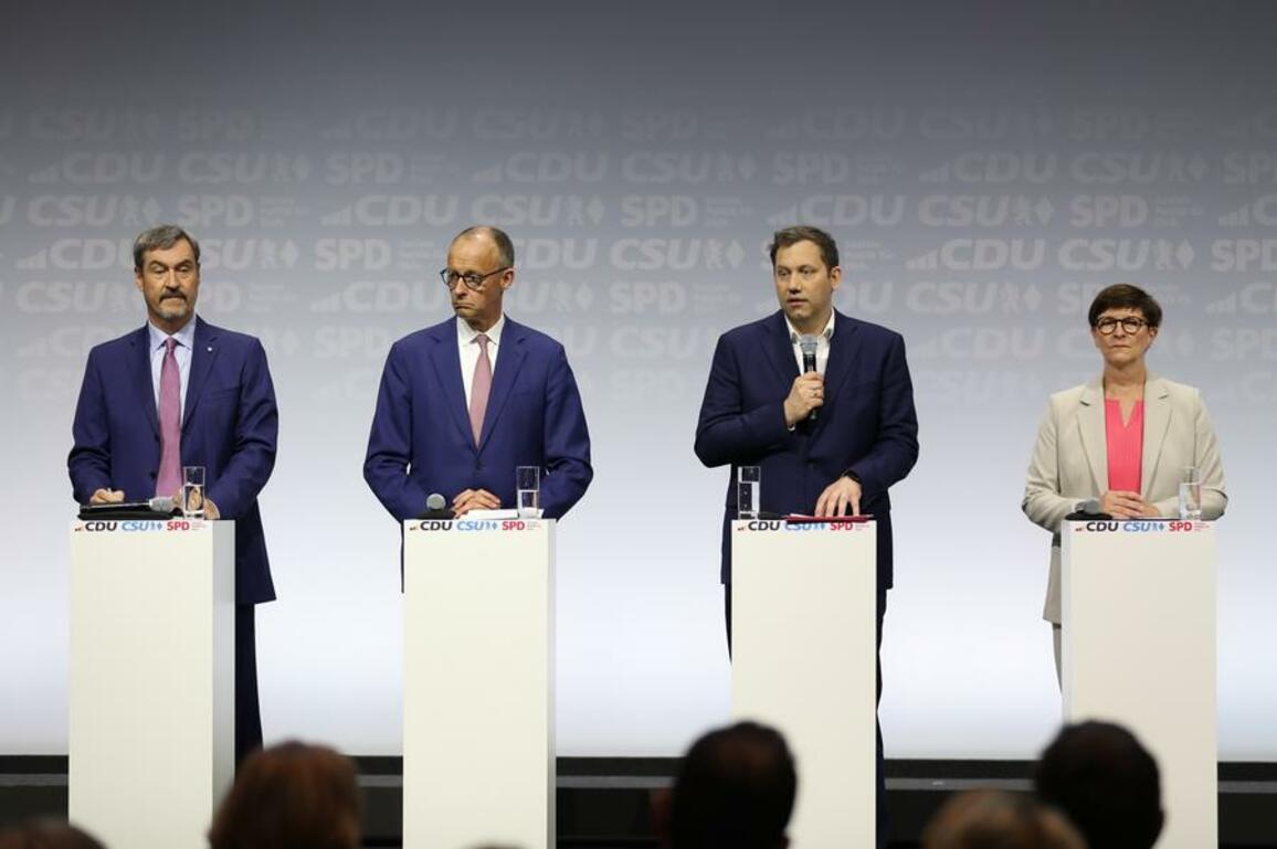 Germany's CDU/CSU, SPD sign coalition deal for new gov't