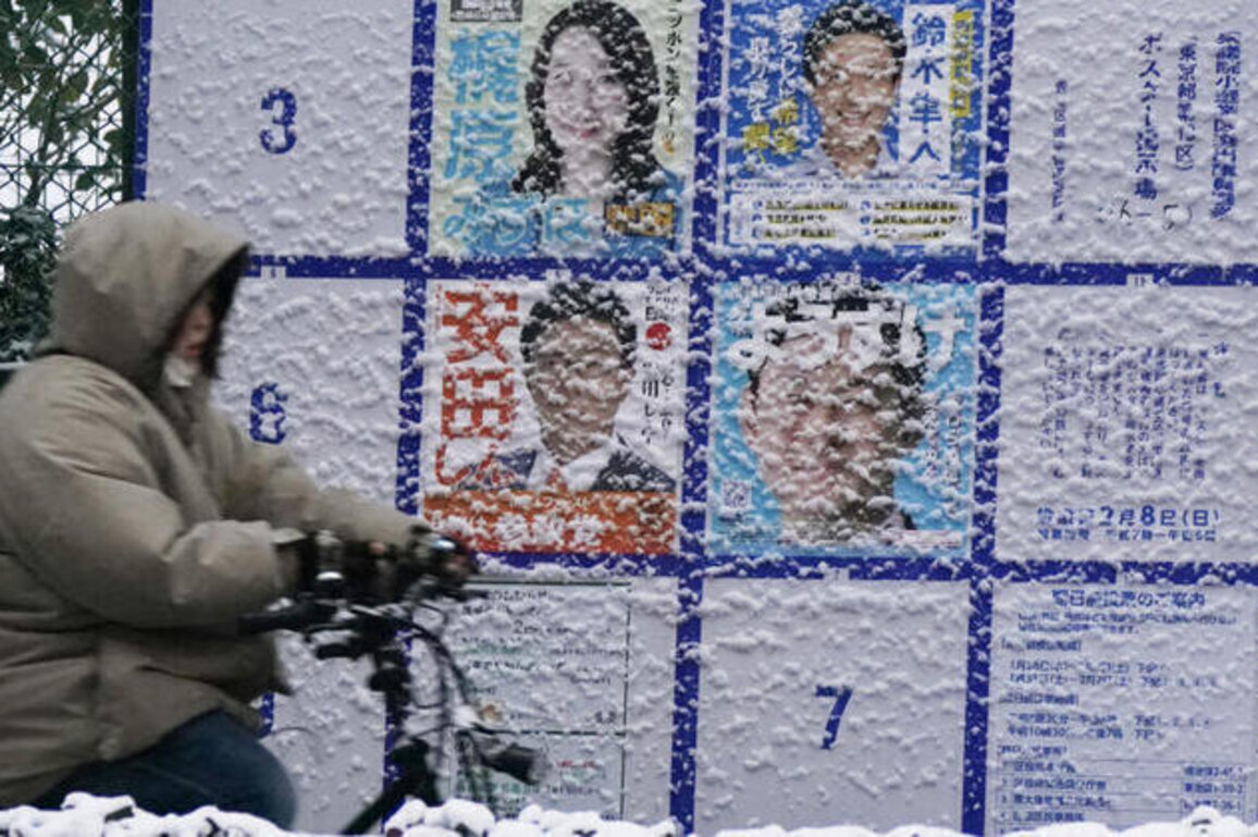 Japan votes in snow-hit snap polls as Takaichi eyes strong mandate