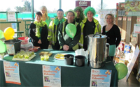 Covers dons green garb for charity