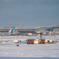 At least 18 injured after plane crashes, flips on landing in Toronto