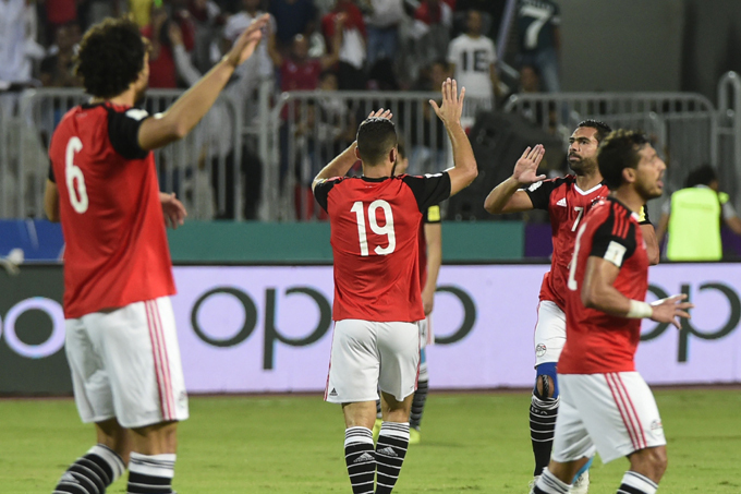 gypts players celebrate their goal against ganda at the org alrab tadium  hoto