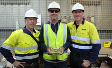  Orminex chairman Daryl Henthorn, major shareholder Wyllie Group chairman Wayne McGrath and alliance partner GBF Underground Mining director Ross Graham with the first bar.