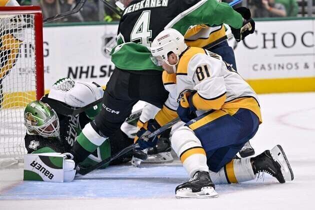 Stars run win streak to 8 with OT defeat of Predators
