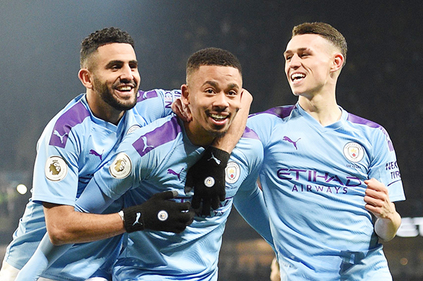 anchester itys razilian striker abriel esus celebrates with anchester itys lgerian midfielder iyad ahrez and anchester itys nglish midfielder hil oden