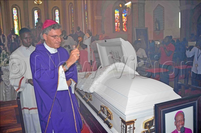  ishop amiano iulio  uzzetti of oroto diocese applying incense on ishop sentongos casket 