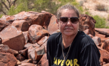Raelene Cooper and hand petroglyph