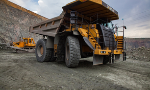 Caterpillar quarry truck transporting iron ore in Kazakhstan