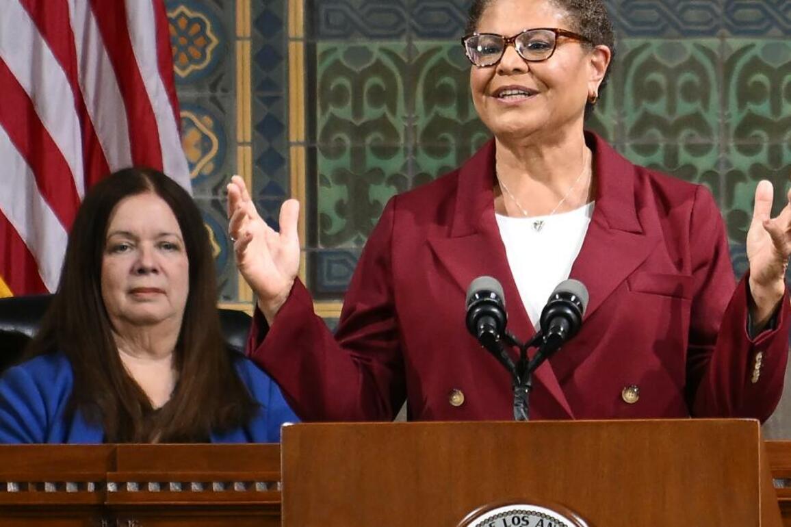 Mayor Karen Bass says she reached a deal to restore police hiring