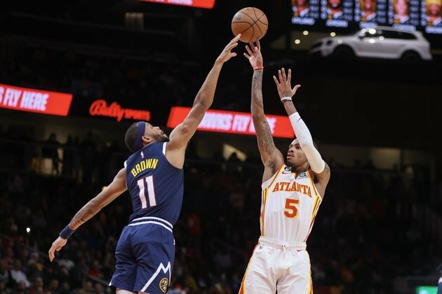 No Trae Young, but Hawks have enough to defeat Nuggets