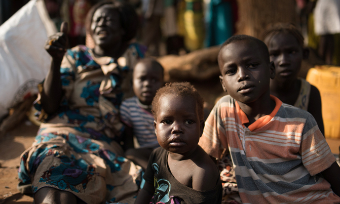 Thousands flee to Uganda to escape South Sudan conflict Thousands flee to Uganda to escape South Sudan conflict