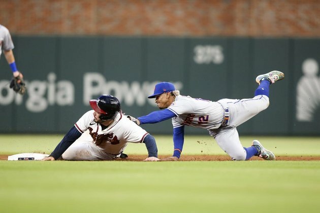 Braves power to 13-1 rout of Mets in series opener