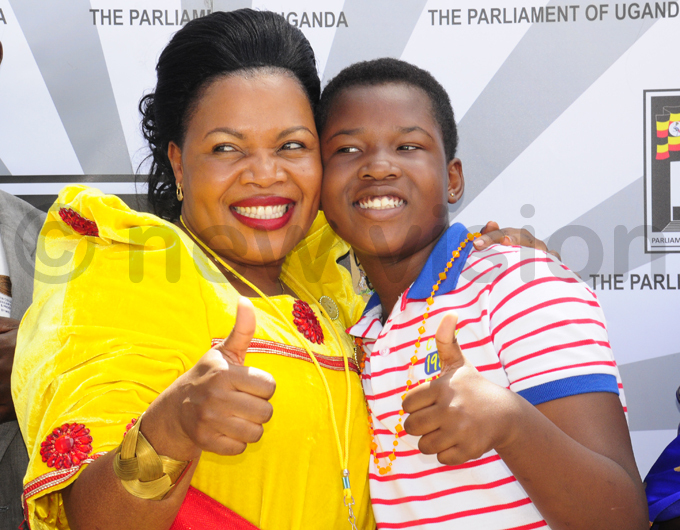 udith abirye celebrates with her daughter after she was sworn in hoto by ddie sejjoba