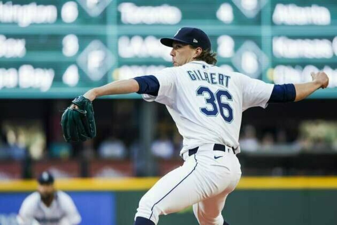 Cal Raleigh homers as Mariners halt Brewers' 11-game win streak