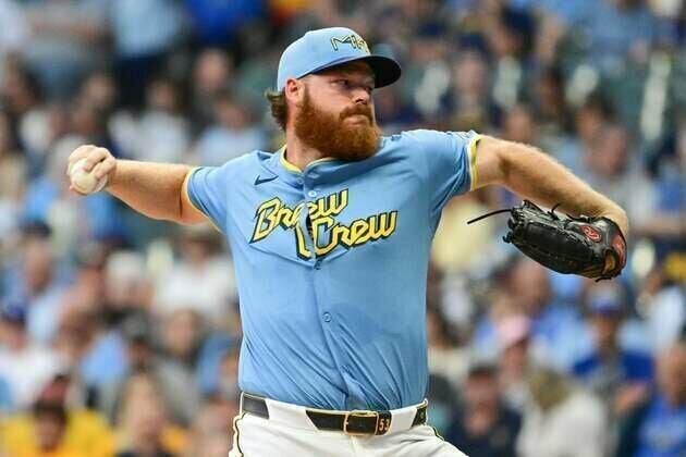 Brewers hold off Mets with game-ending out at plate