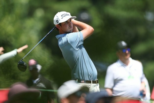 J.T. Poston shoots 62 to grab John Deere Classic lead