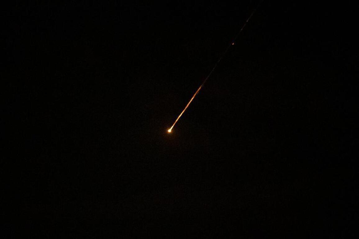 Mideast in Pictures: Missile fire illuminates Jerusalem's sky
