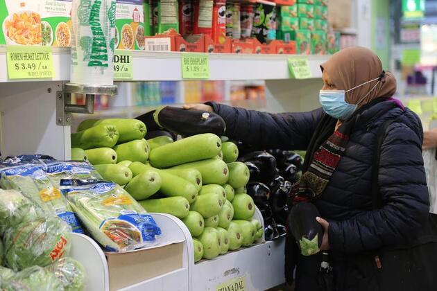 Roundup: Americans struggling financially amid rising living costs, surveys show