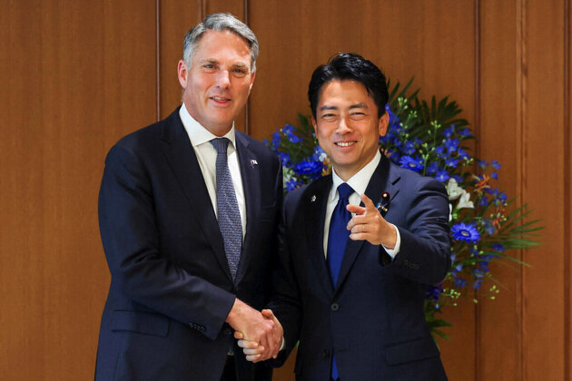 Australia, Japan sign AU$10 billion warship deal