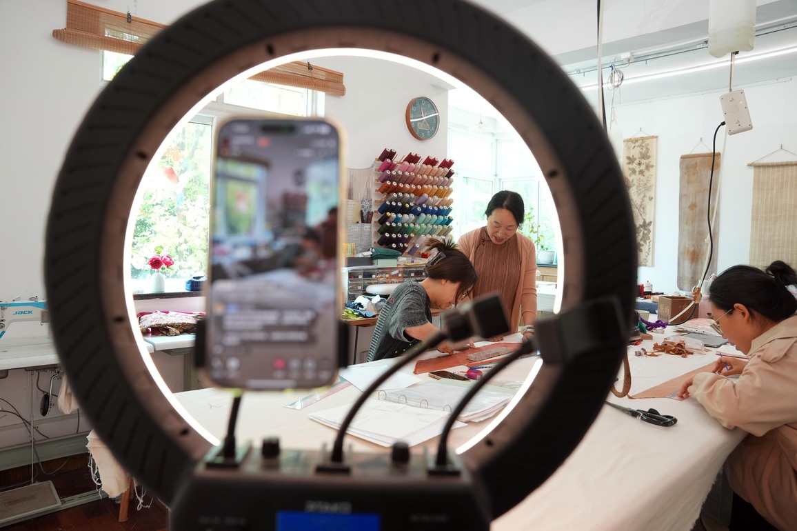 ChineseToday | Escaping urban hustle with stitches: Qipao studio owner's life in suburban Shanghai