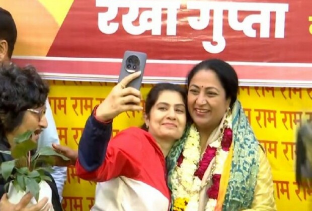 People gathered to greet newly appointed Delhi CM at her residence