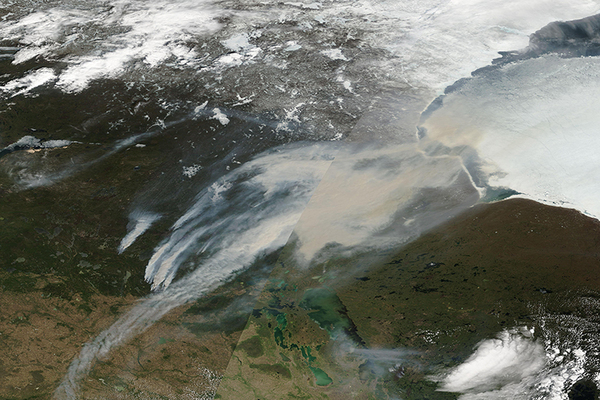 Wildfires across western Canada force miners to evacuate