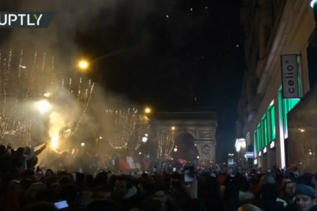 Morocco fans take over Paris landmark after World Cup joy