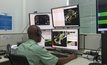 Vale employee monitoring the operation of autonomous trucks at Brucutu in Brazil 