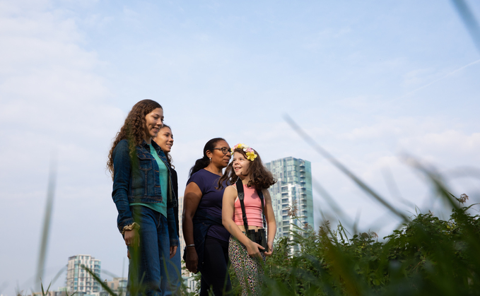 A group of young people walking in nature / Credit: Eleanor Church - The Wildlife Trusts 