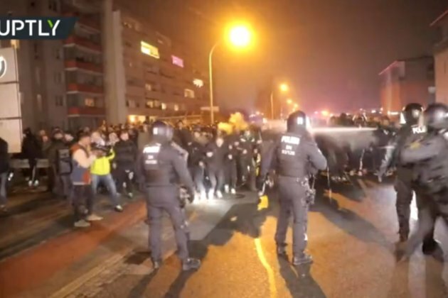 police pepper-spraying violent hooligans at anti-lockdown march