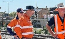 Aurizon CEO Andrew Harding, Aurizon Port Services manager Jackie Gregory, Aurizon bulk executive Clay McDonald and Queensland resources minister Scott Stewart at the Port of Townsville.