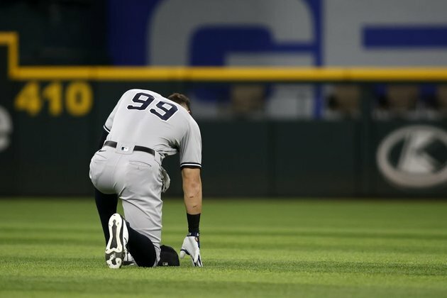 Yankees rally for 5-4 win over Rangers in Game 1