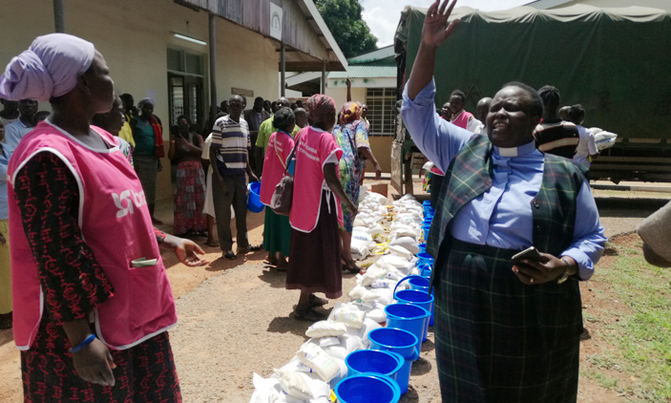 Parliament staff donate food items to Teso Parliament staff donate food items to Teso