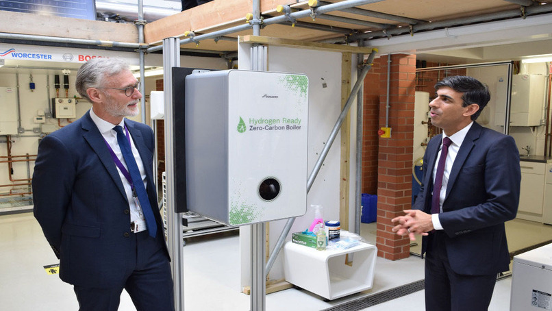 Carl Arntzen (left) shows the Chancellor that Worcester is hydrogen ready during a visit to HQ