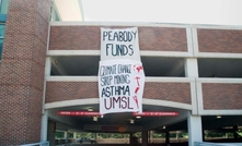 Activist group deploys banners in Peabody protest